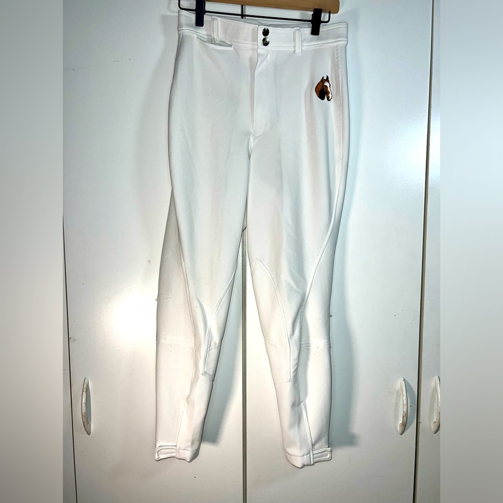 White ribbed riding breeches with horse embroidery. Size medium.